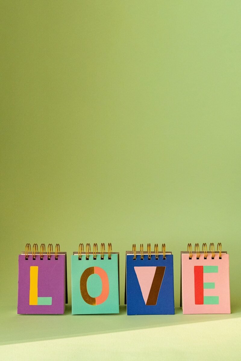 a colorful calendar with the word love spelled out